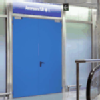 Quali sono, per una porta tagliafuoco, gli accessori obbligatori e quali facoltativi?